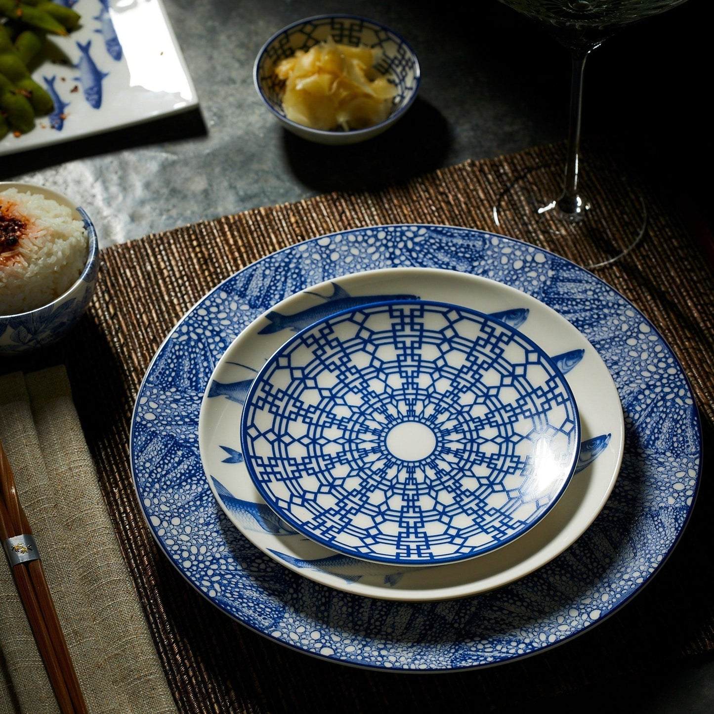 a blue and white plate sitting on top of a table