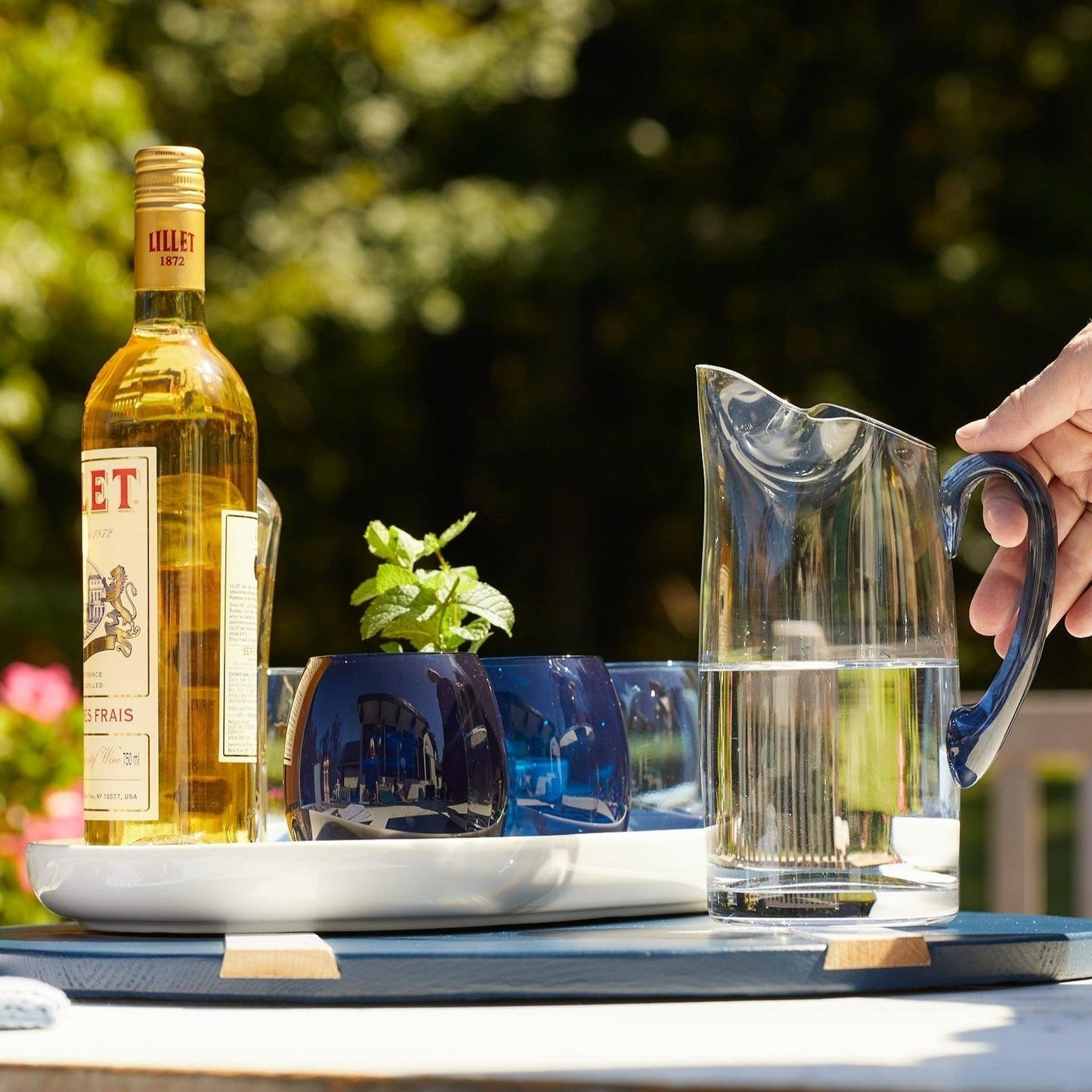 a bottle of wine and a glass on a table