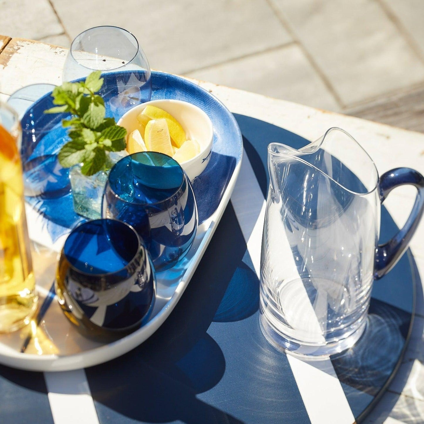 a plate of food and a glass of water on a table