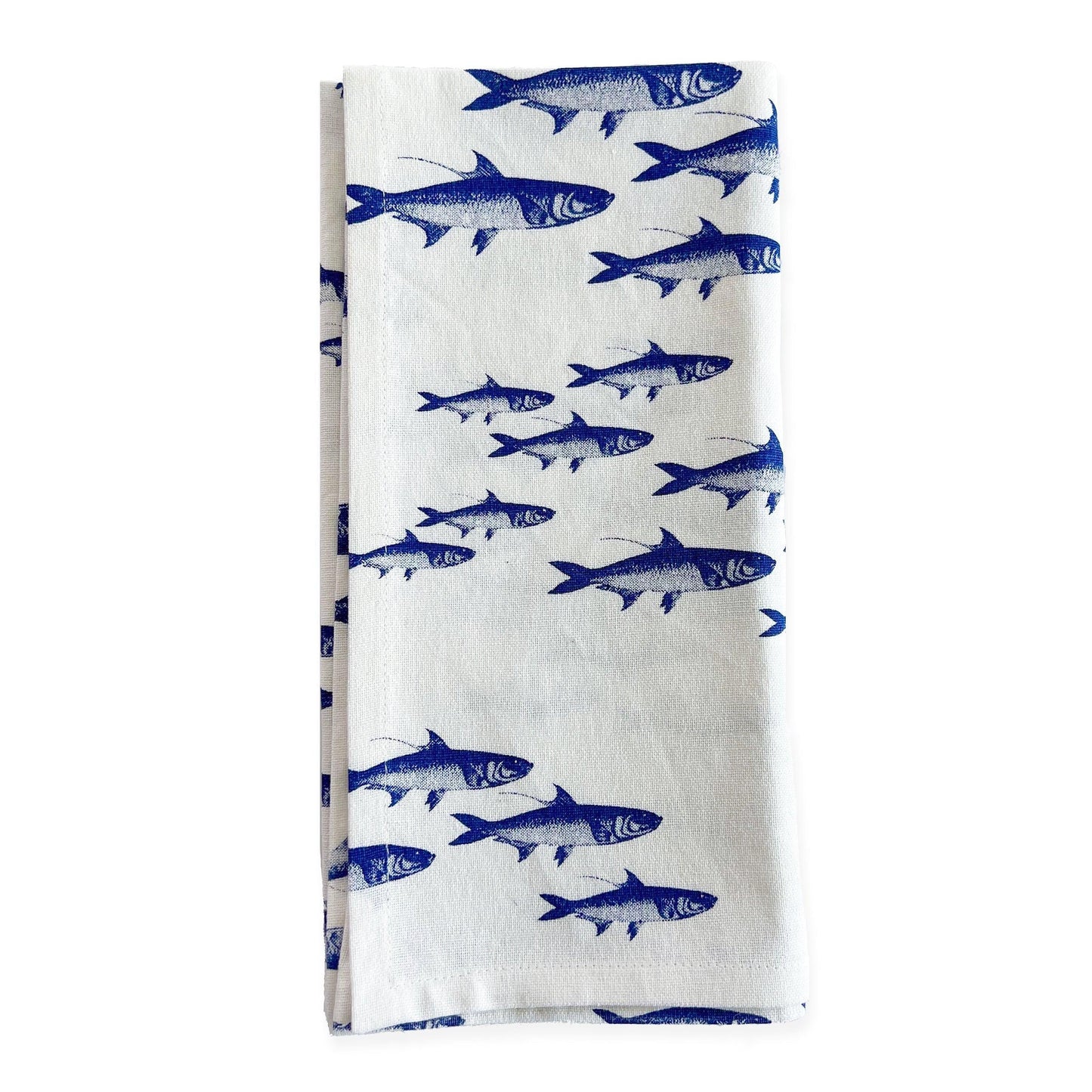 a blue and white dish towel with fish on it