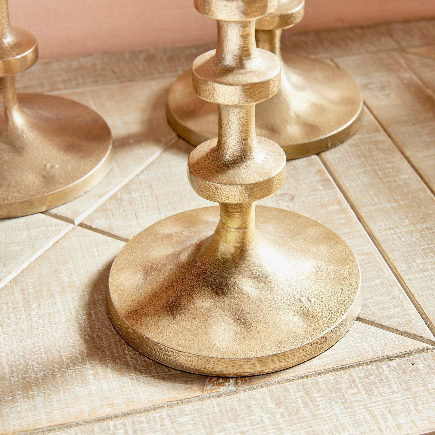 Close up of gold candle holder
