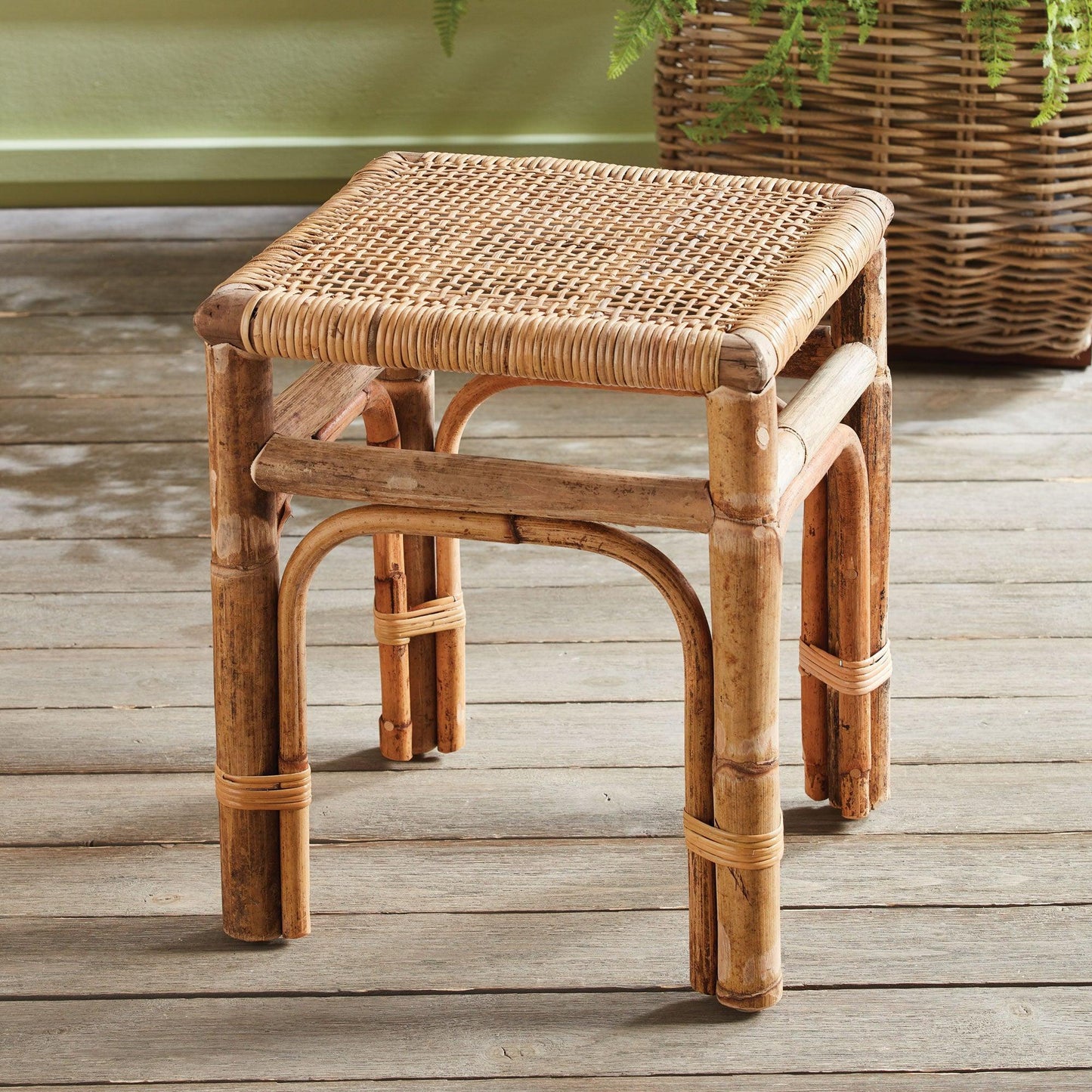 Bamboo and rattan side table on wood floor