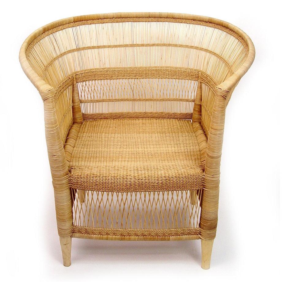 a wicker chair with a white background