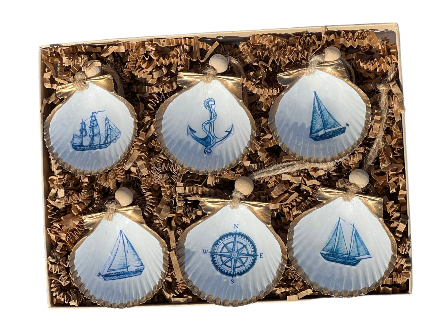 set of six shell ornaments with blue nautical designs