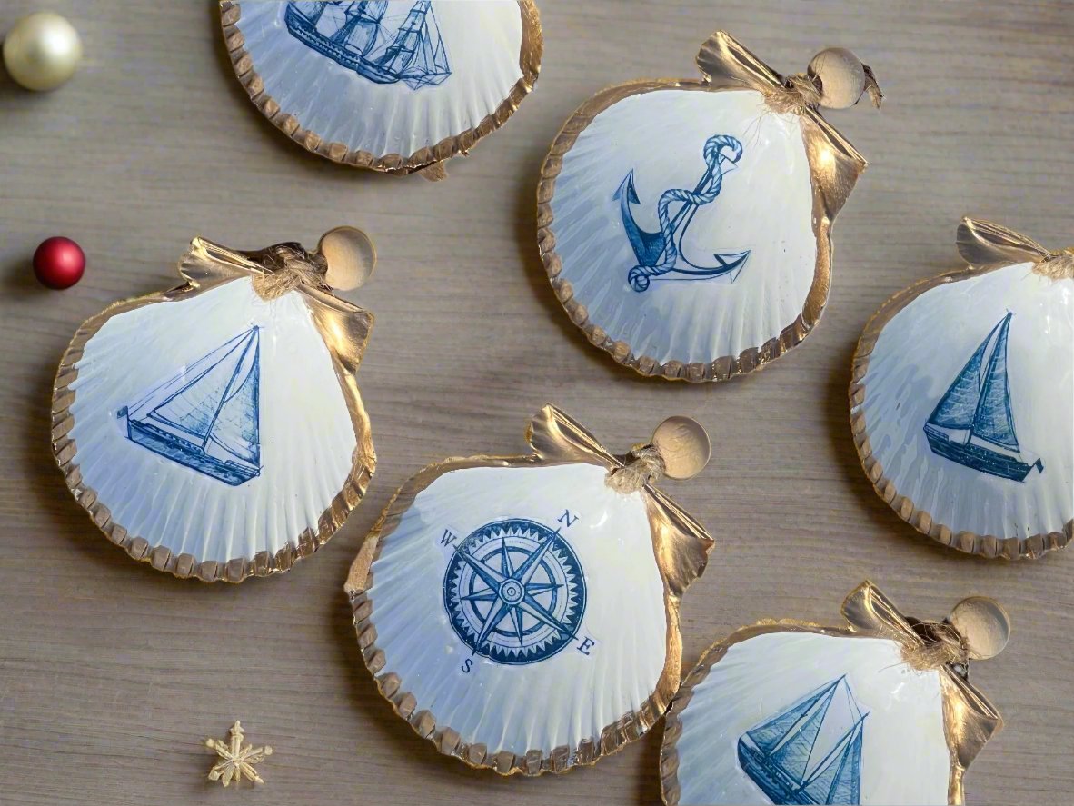 six nautical shell ornaments on a wood table