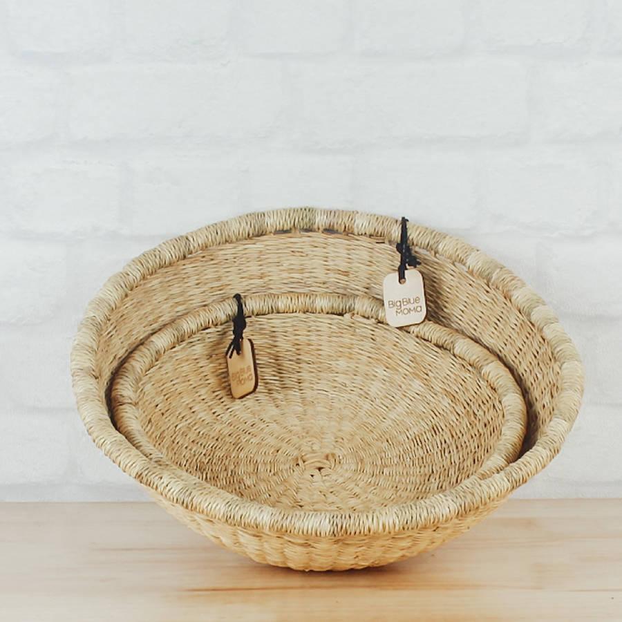 a wicker basket with a tag hanging from it