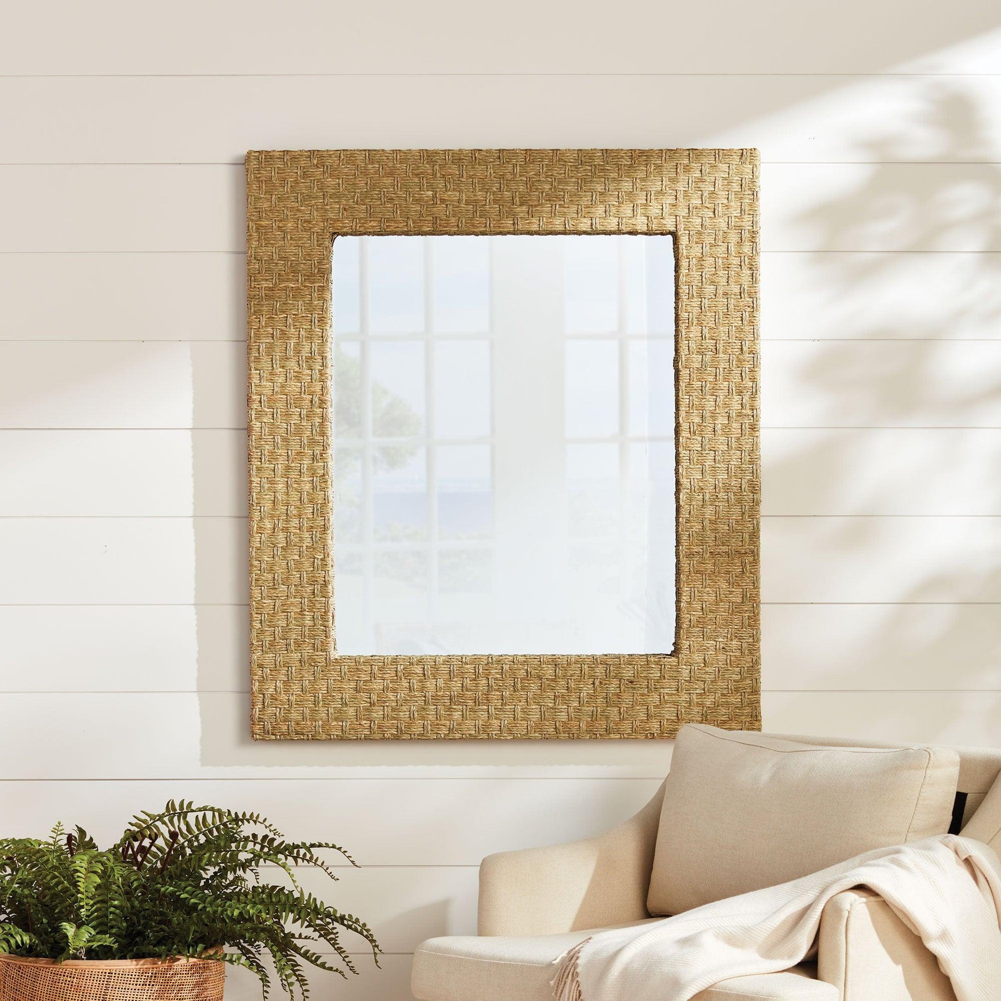 Natural fiber mirror on a shiplap wall