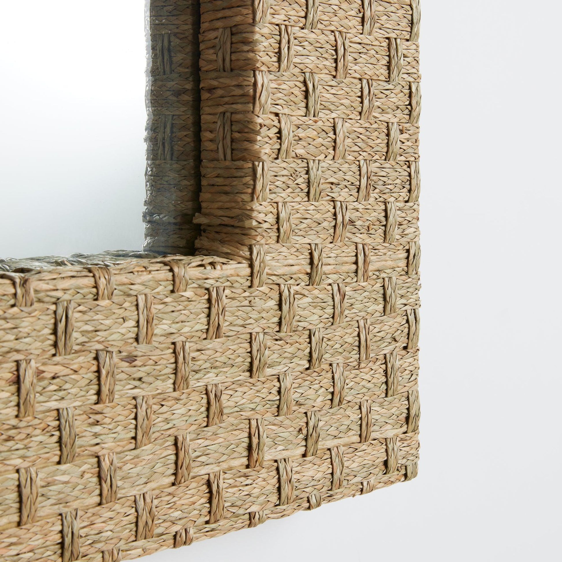 Close up of woven mirror