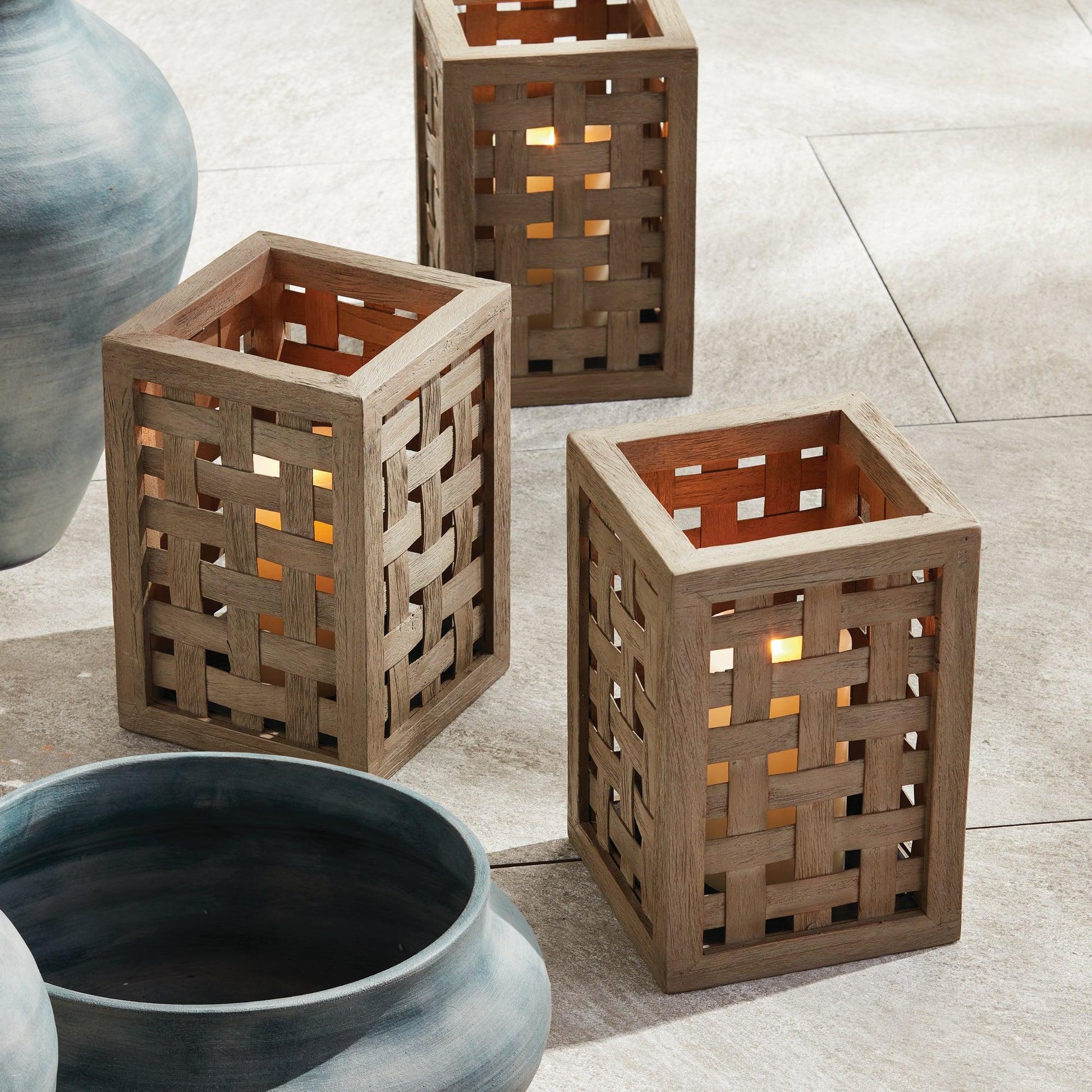Three teak wood lanterns