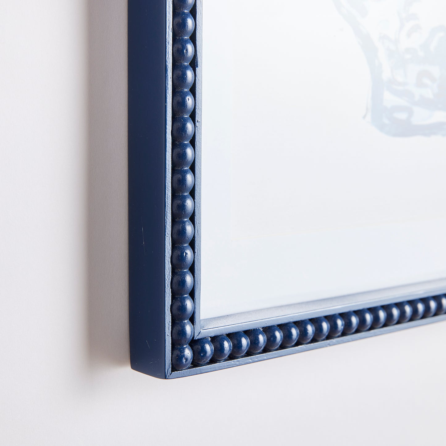 close up of blue beaded frame