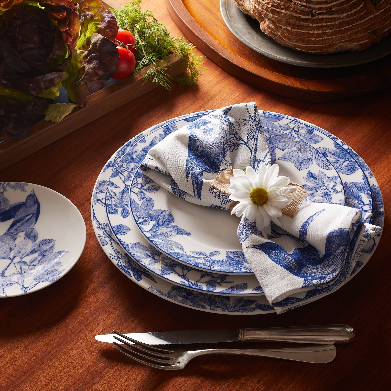 blue and white dinnerware place setting