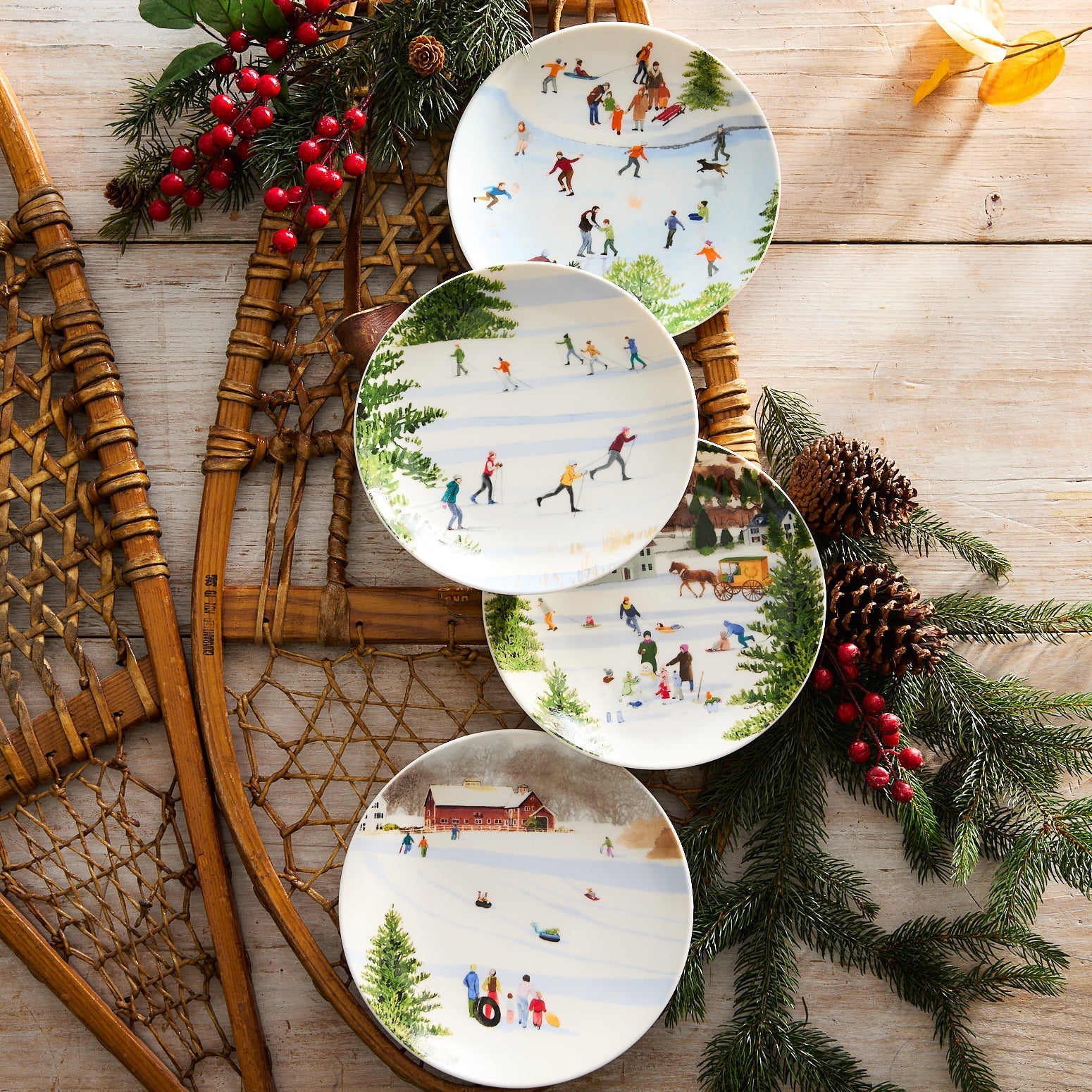 four christmas salad plates on a rattan snowshoe