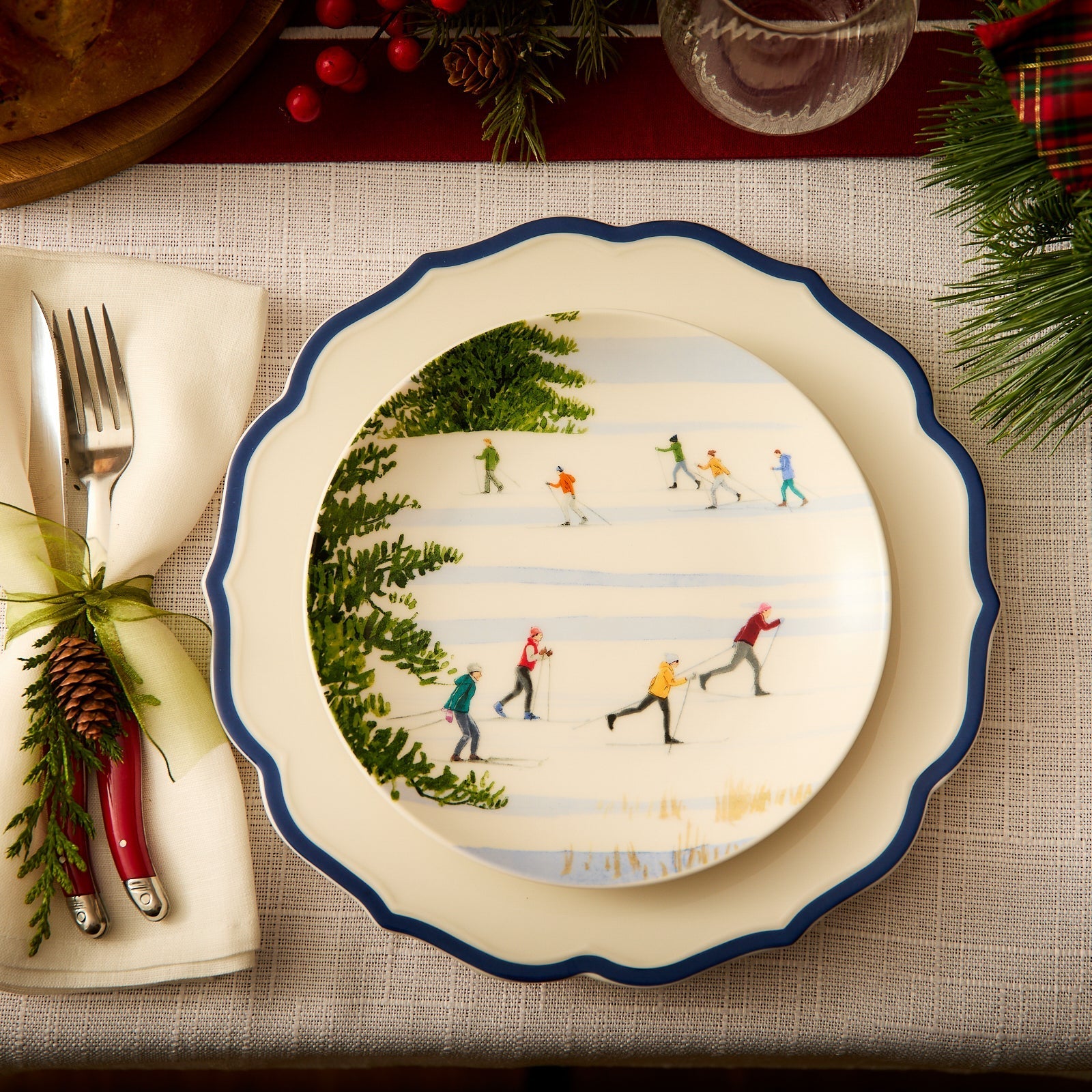 christmas salad plate on white scalloped plate with blue trim