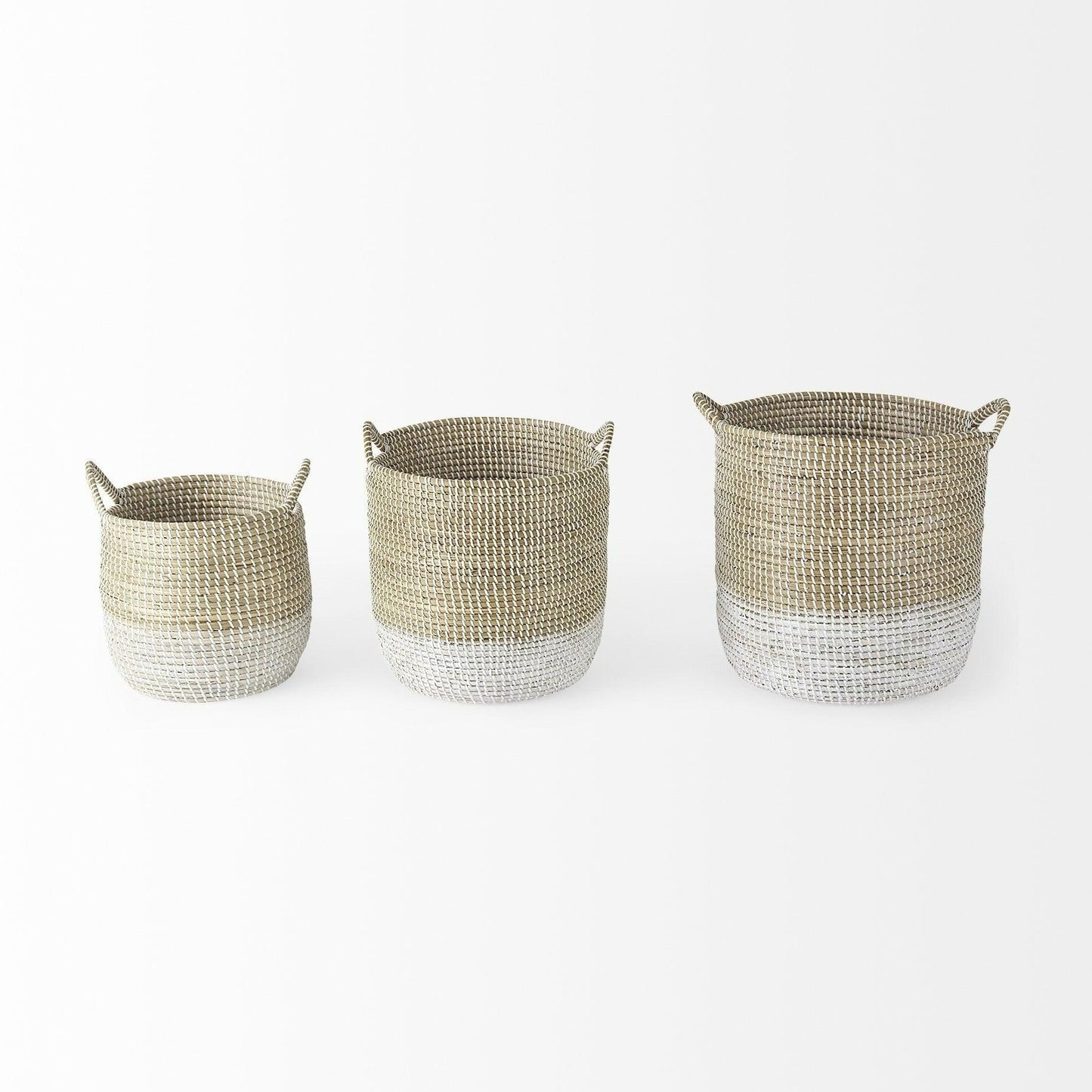 three woven baskets sitting next to each other