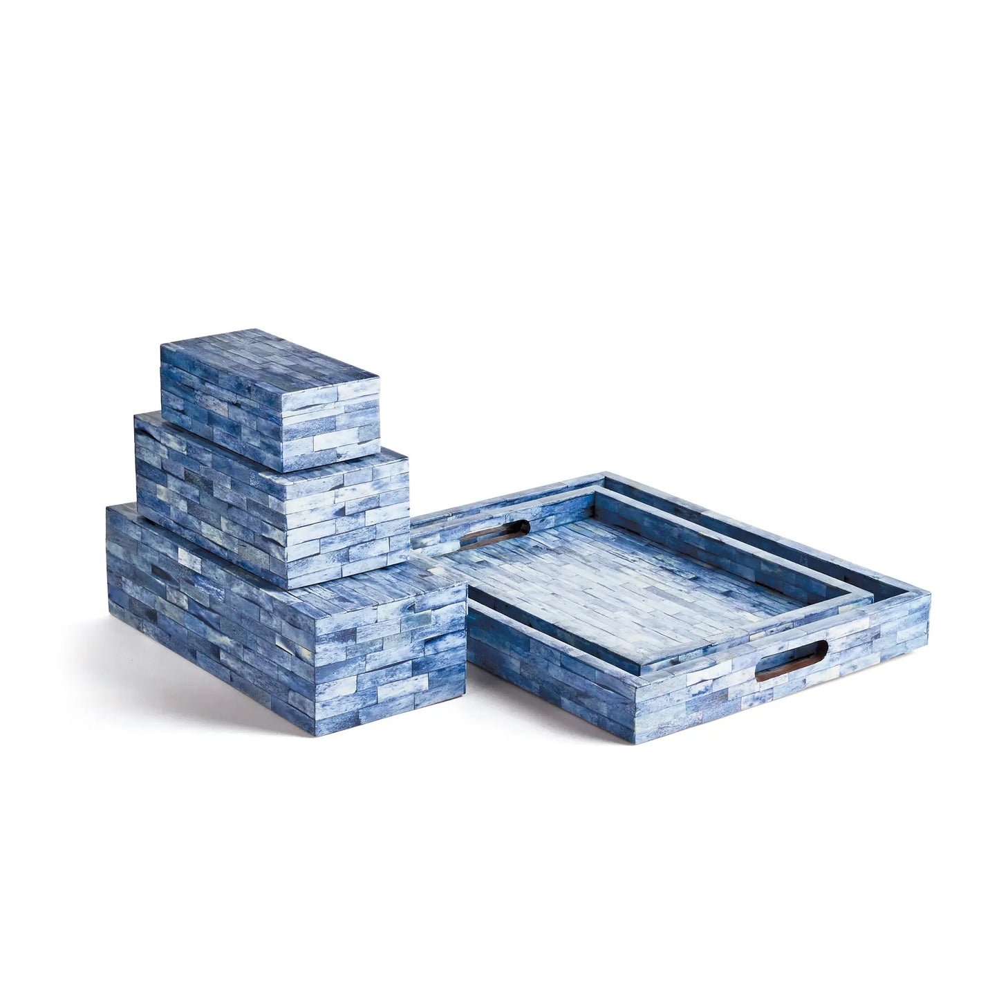 three blue decorative boxes and two blue trays