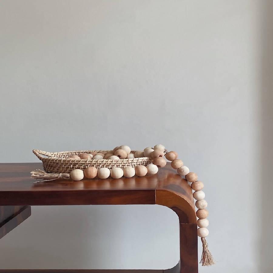 a wooden table with a basket on top of it
