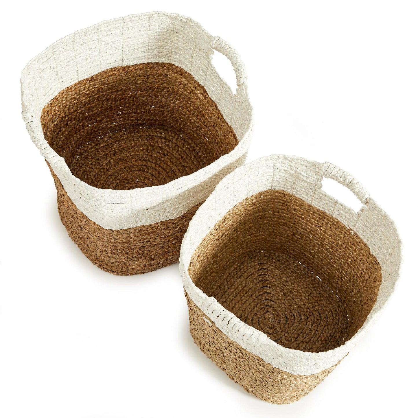 a pair of baskets sitting on top of a white table