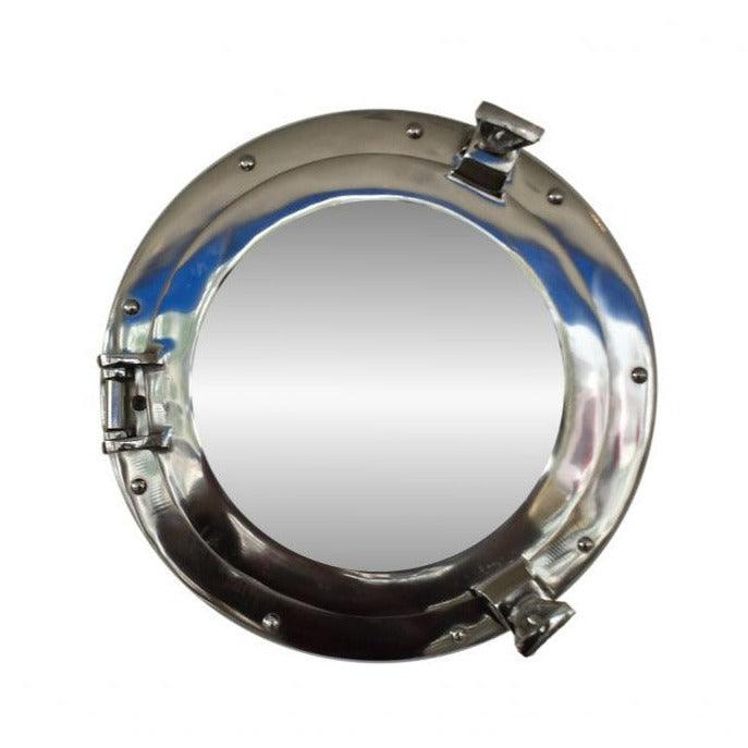 a metal porthole mirror with a white background
