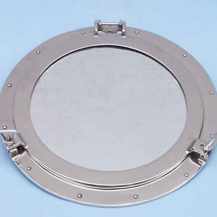 a close up of a chrome porthole mirror