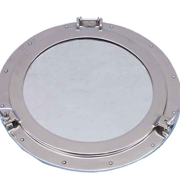 a metal porthole mirror on a white background
