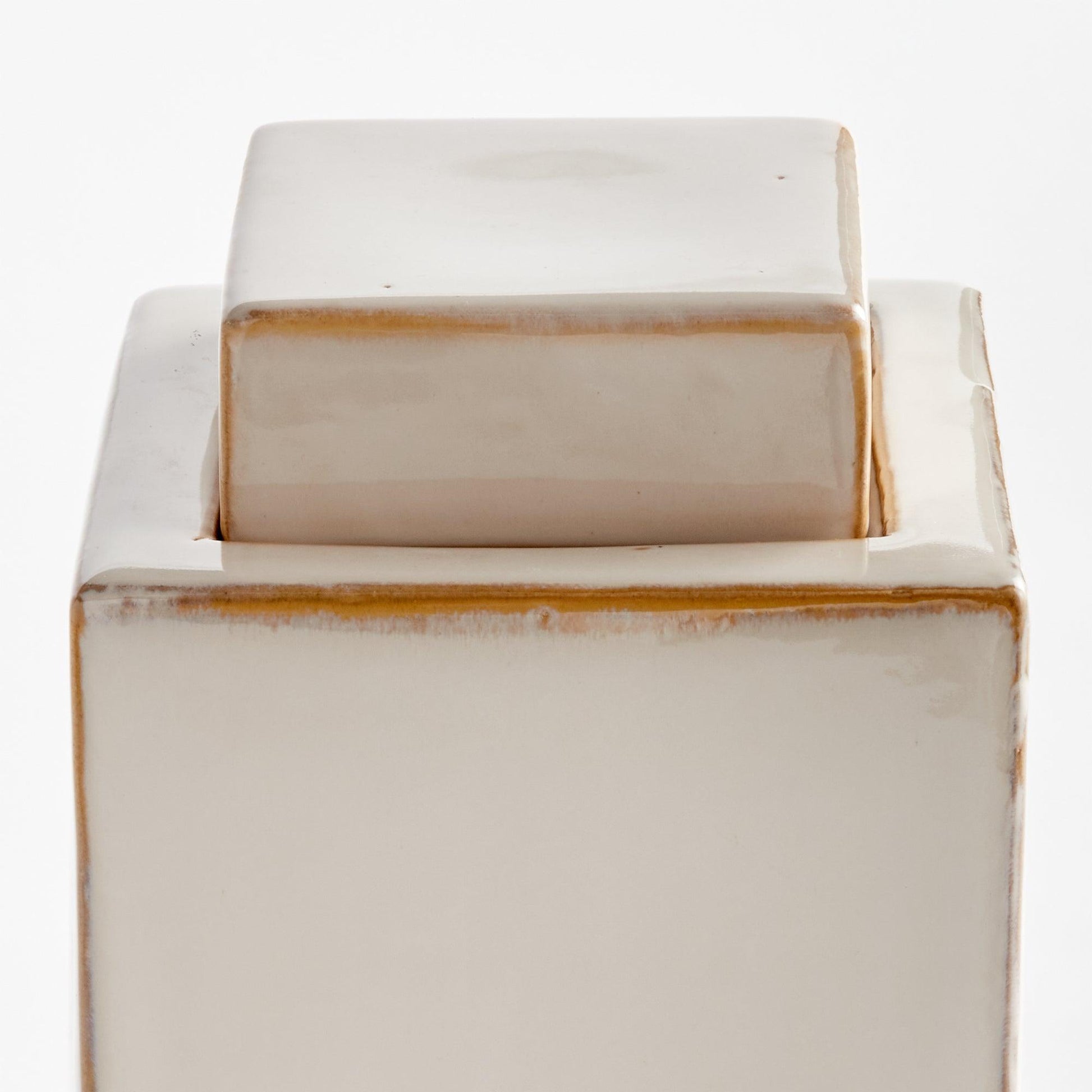 Close up of cream colored jar