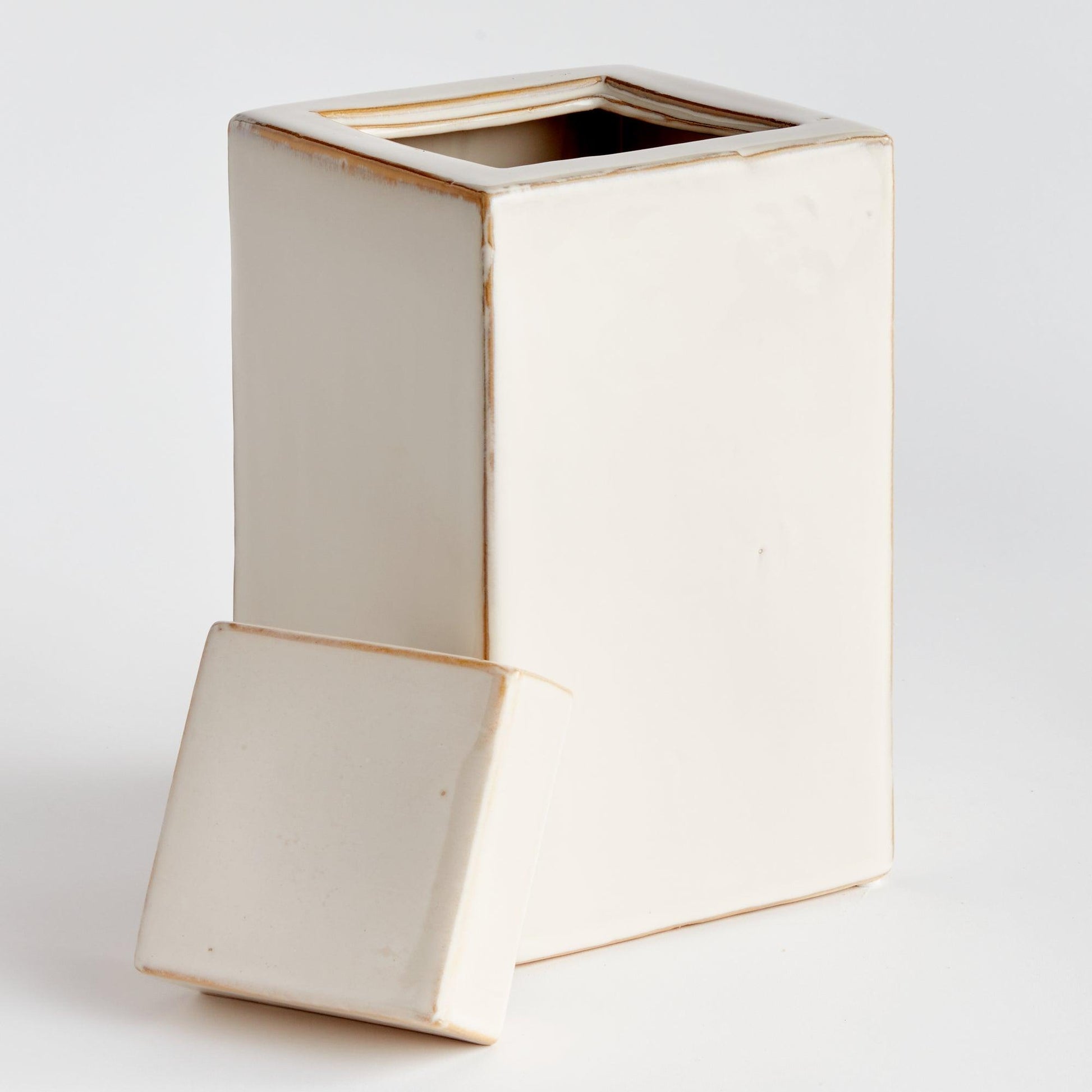 Cream colored jar with lid off