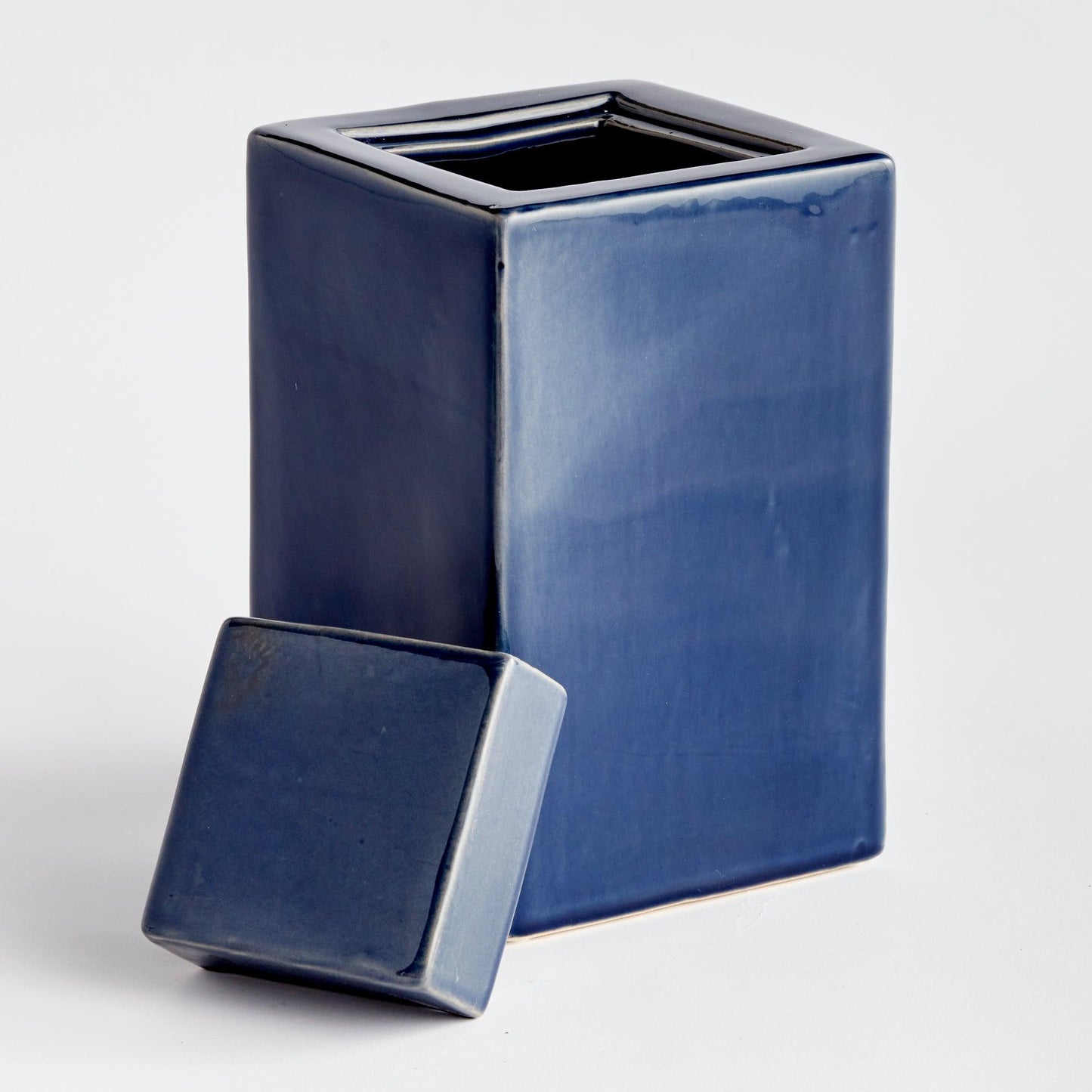 Dark blue jar with lid off