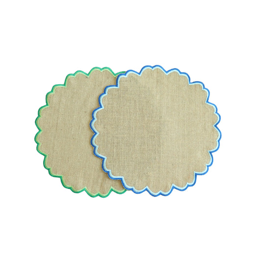 two burlap placemats with colored edge
