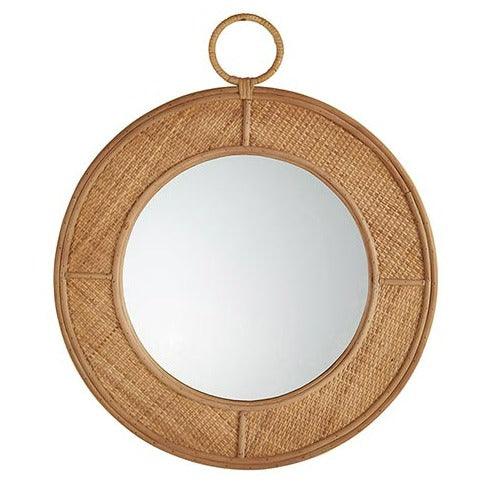 a round mirror with a rope around it