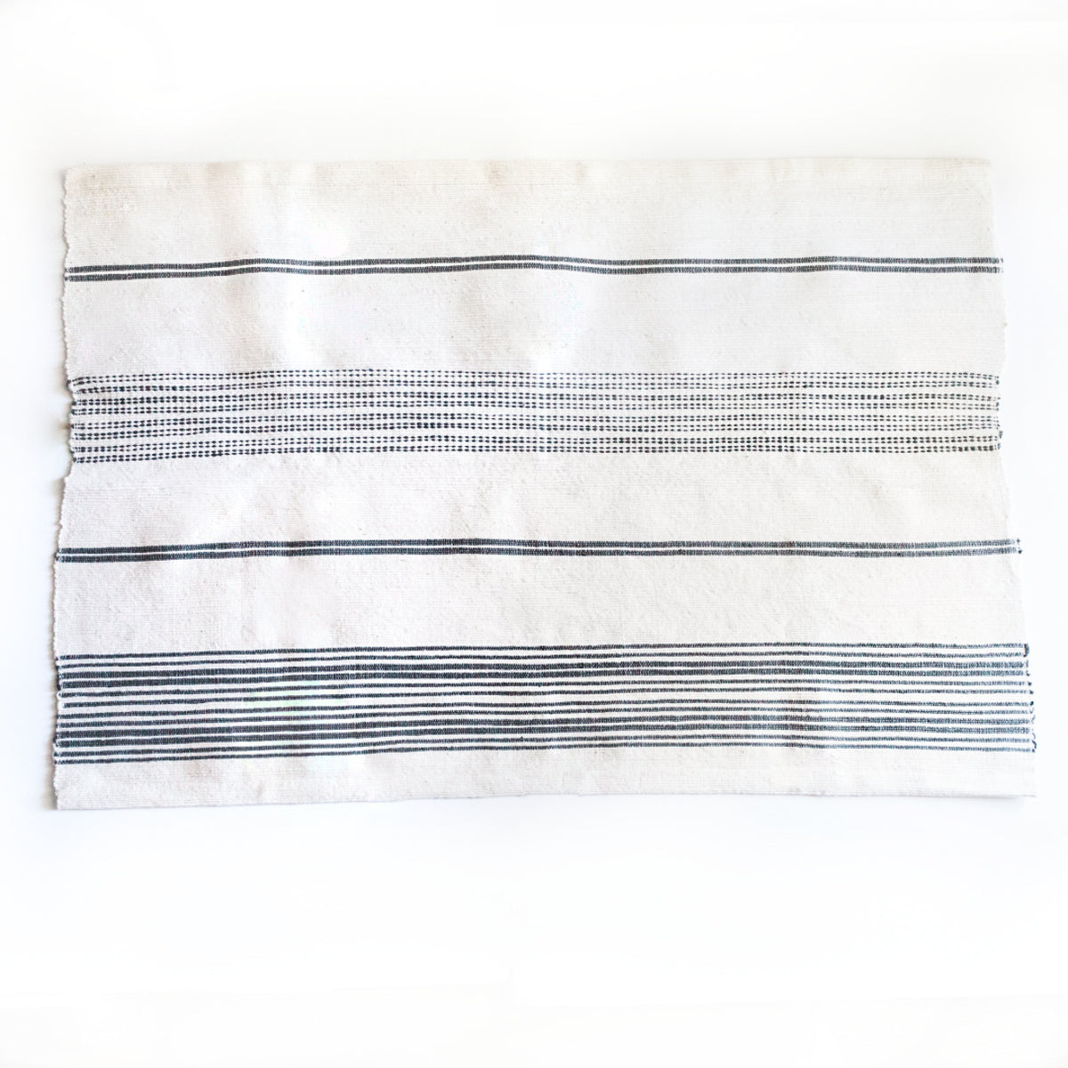 white and navy striped bath mat