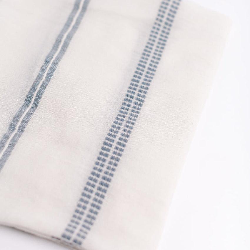 close up of blue and white blanket