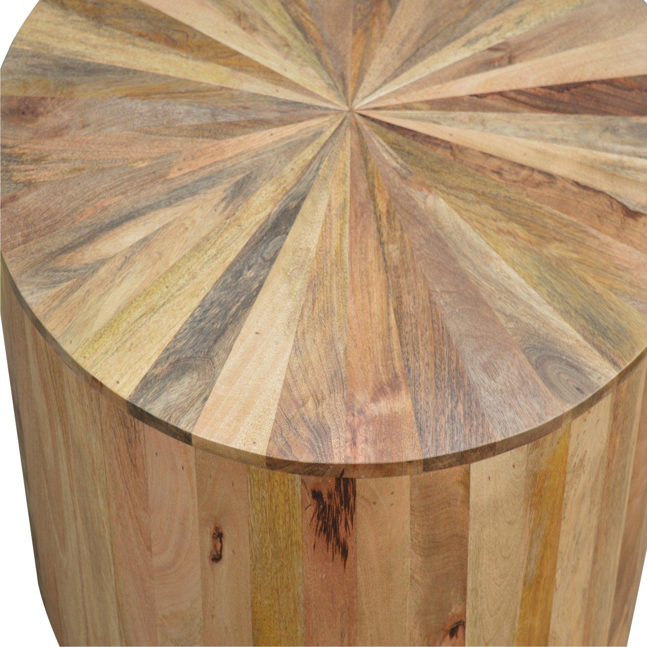 a wooden table with a circular design on it