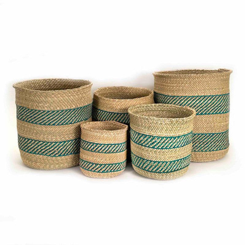 a set of four baskets sitting next to each other