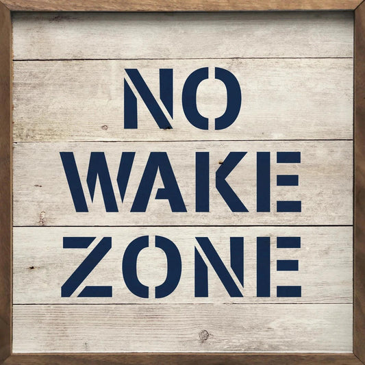 a wooden sign that says no wake zone