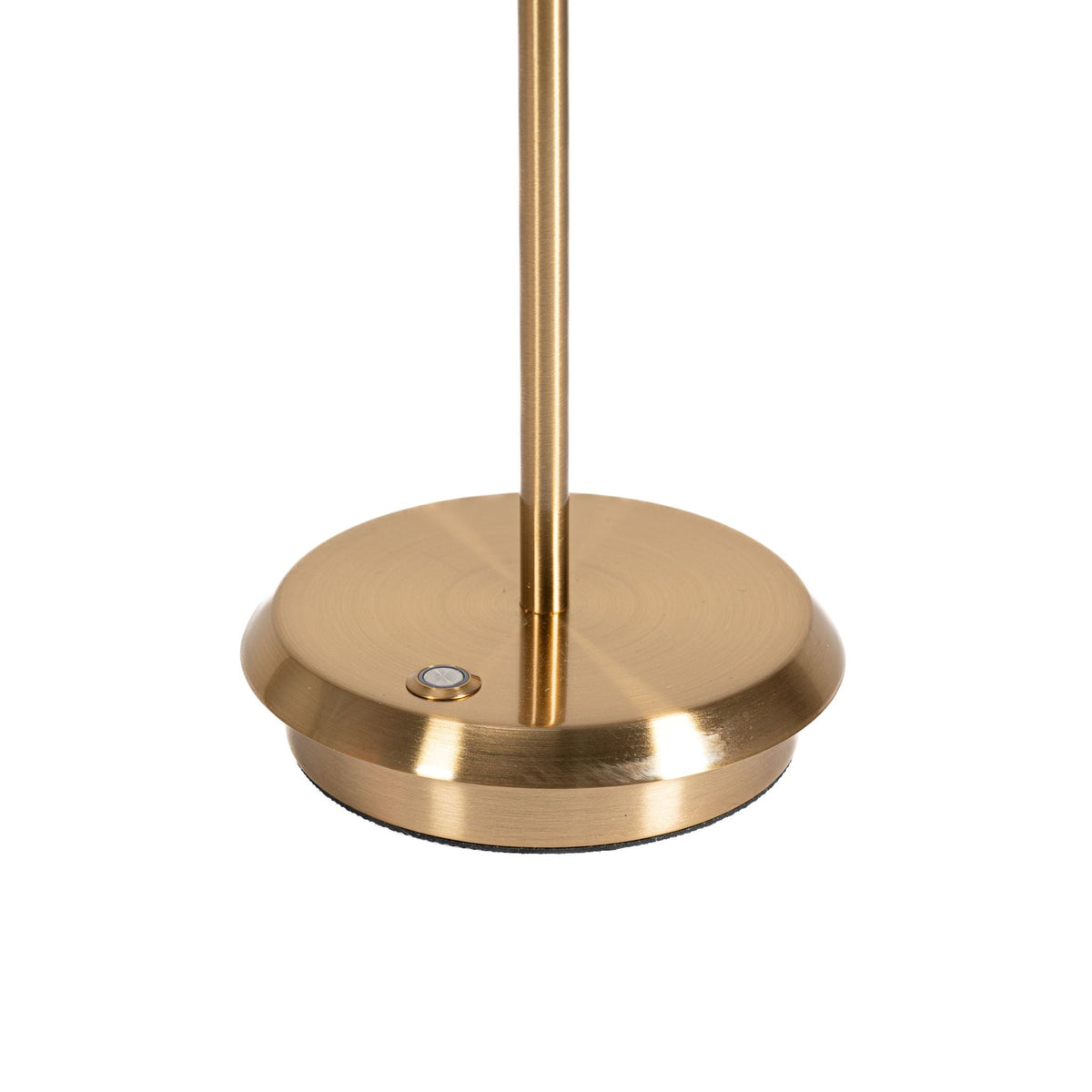 	Close-up of the round gold-finish lamp base showing its button