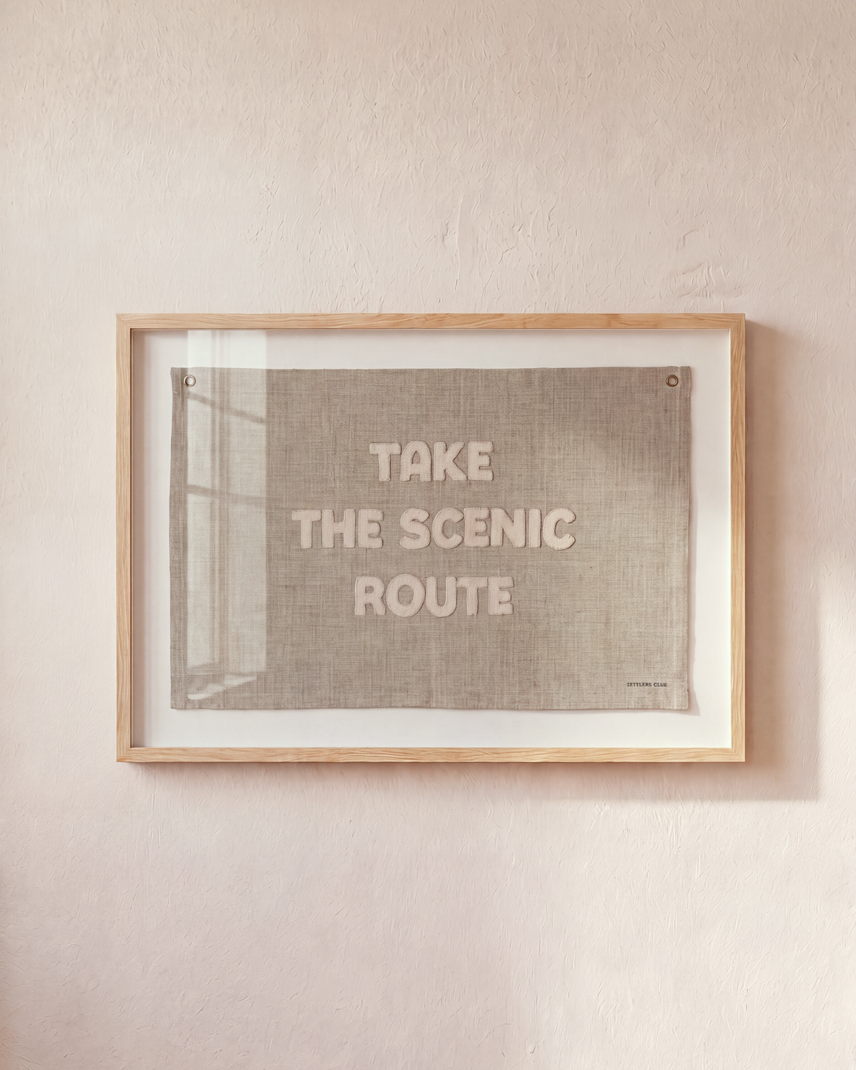Take the Scenic Route embroidered sand-colored flag in a natural wood shadowbox frame