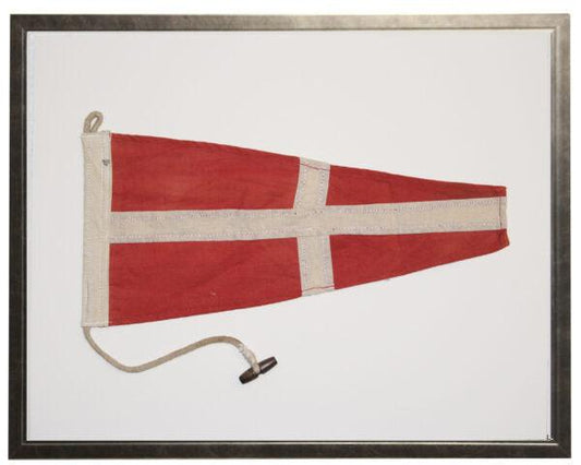 a picture of a red and white flag hanging on a wall