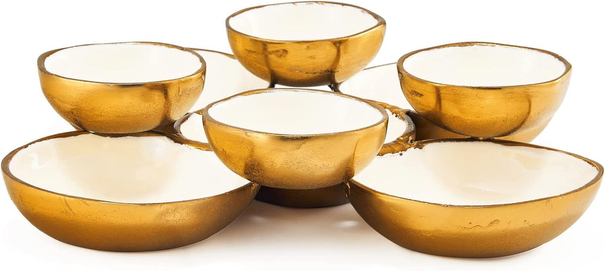 Round gold and white serving bowls in cluster design
