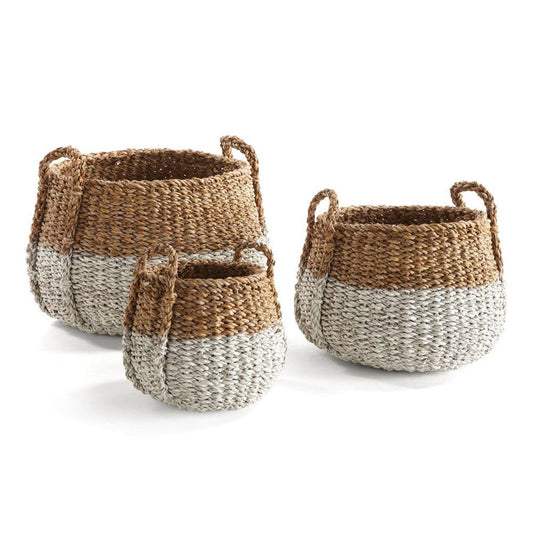 a pair of baskets sitting on top of each other