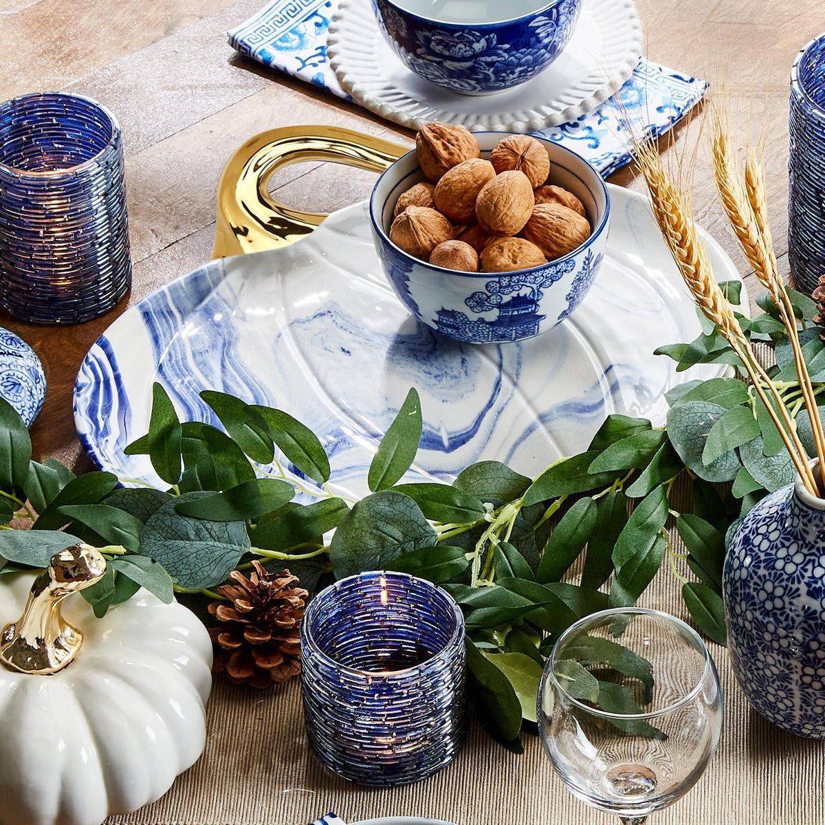 Blue and white pumpkin platter styled for fall entertaining
