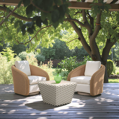 Two Solara ivory outdoor swivel chairs arranged around a woven coffee table on a shaded deck