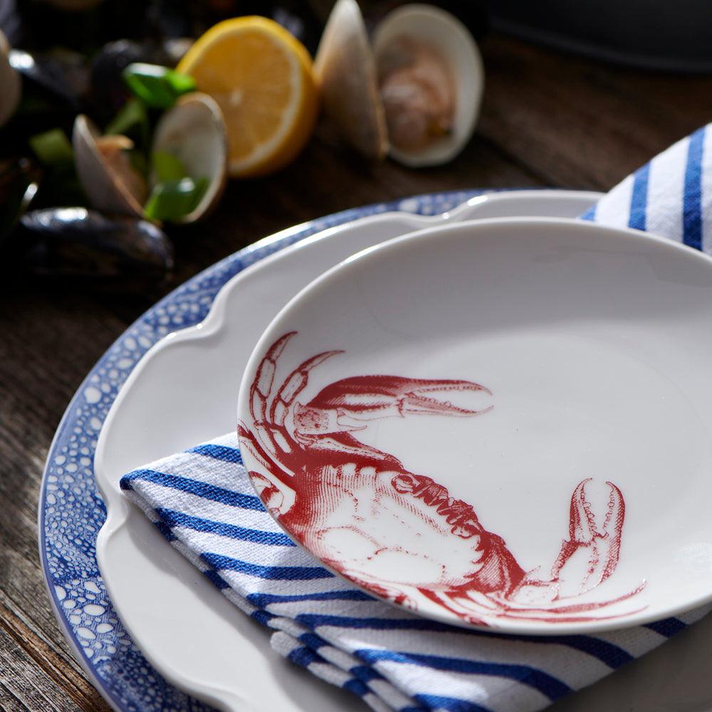 a plate with a crab painted on it