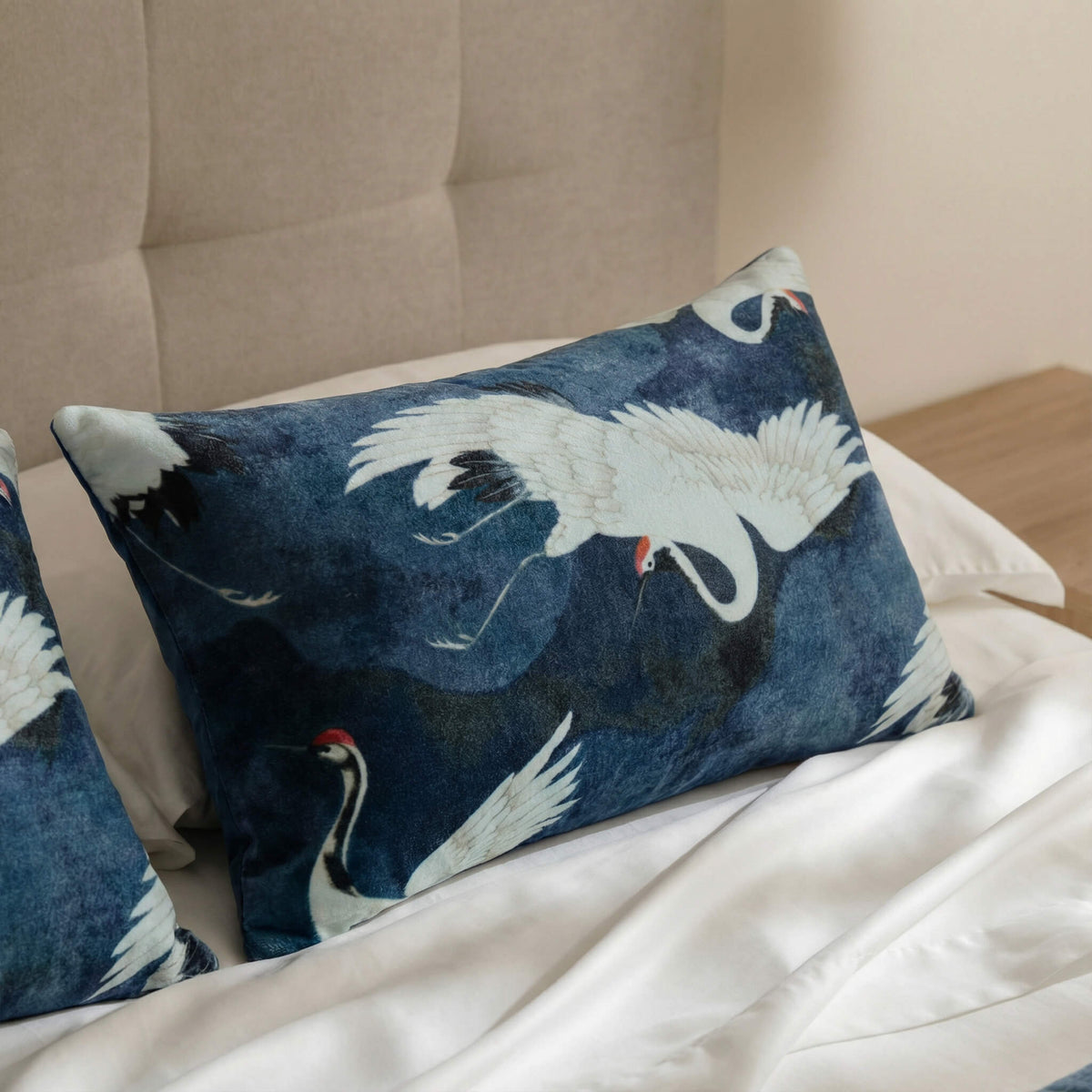 Baritone Blue velvet lumbar pillow with crane design
