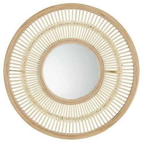 a round mirror with a wooden frame