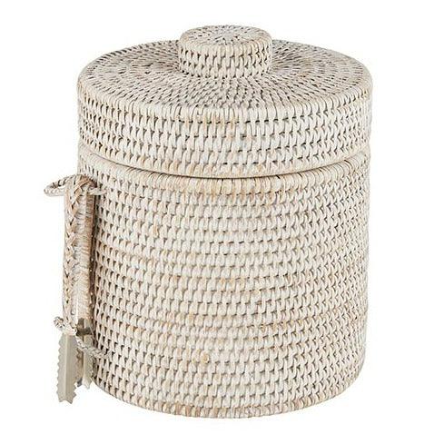 a white wicker box with a handle