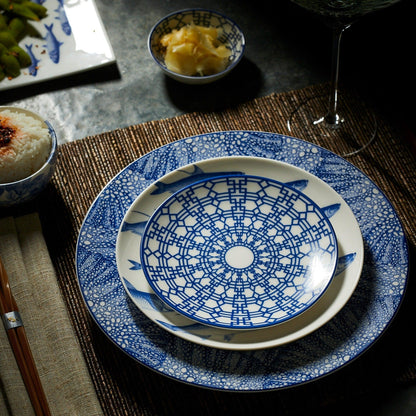 Newport Garden Gate blue small plate layered with fish-pattern and coastal blue dinnerware