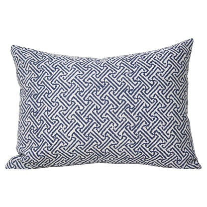 	Java Java Navy rectangular lumbar pillow cover styled with an insert, showing its repeating angular geometric pattern