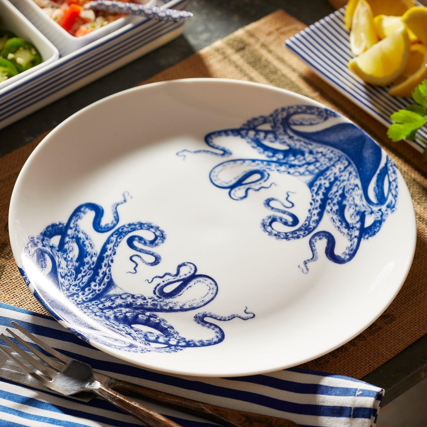 a blue and white plate with an octopus on it