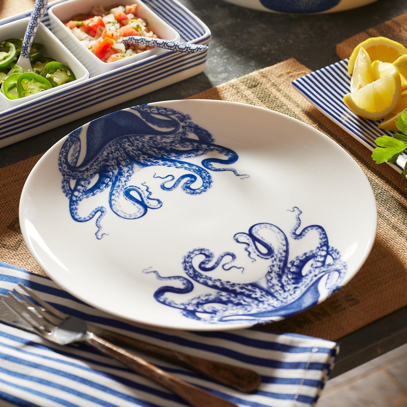 a blue and white plate with an octopus on it