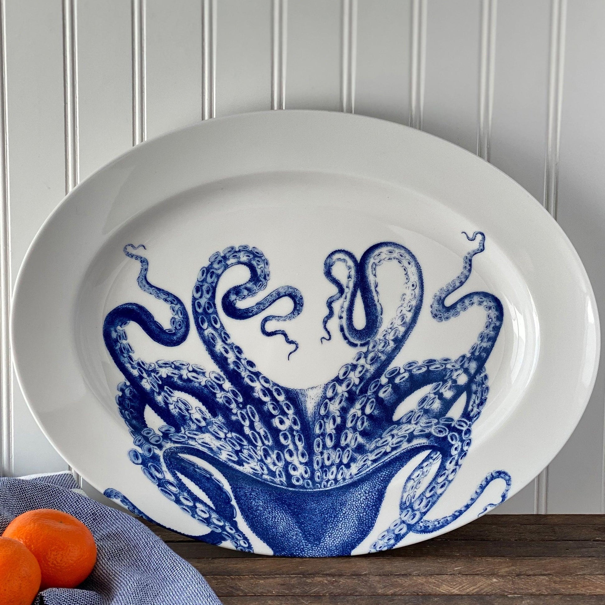 a blue and white plate with an octopus on it